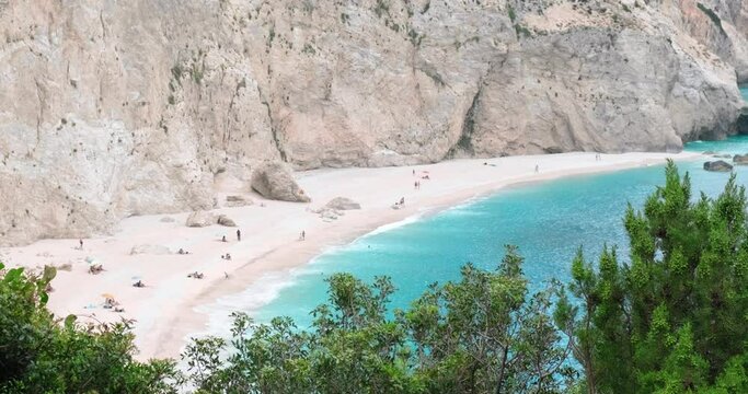View on famous beach Porto Katsiki with tourists at Lefkada island, Greece. Summer holidays in Greek Ionian islands concept.