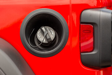Red sports utility gas cap and tail light