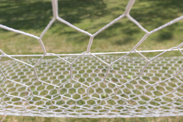soccer goal net on green grass