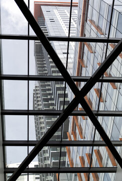 Architecture in the details. Highrise building bottom-upwards. Modern architecture