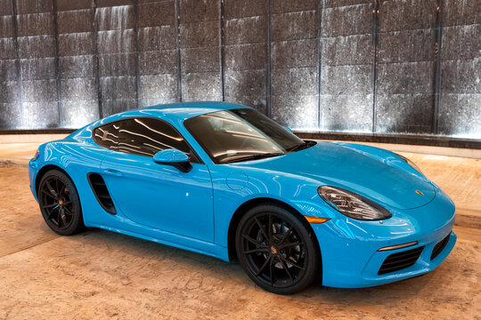 Palm Beach, Florida USA - March 22, 2021: Blue Porsche 718 Cayman. Top Side View.