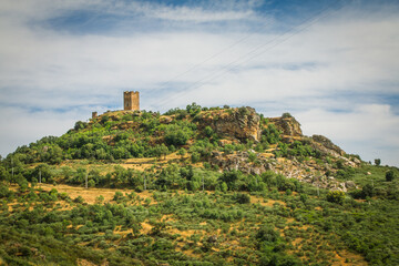 Ancient stone castle tower of Penas Roias, located in the Natural Park of the Douro river, in Portugal