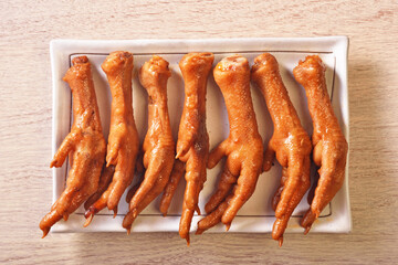 Marinated chicken feet on a plate