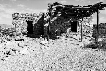 Black & white photo of a  house in the desert in West Texas