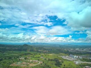 Fototapeta na wymiar Blue sky and green mountains