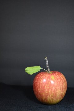red apple with black background 