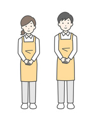 エプロン姿の男性と女性