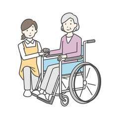 介護スタッフと車椅子のシニア女性