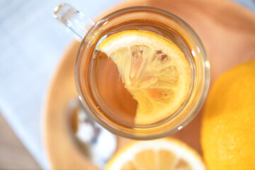 Close-up of lemon tea brewed in a glass