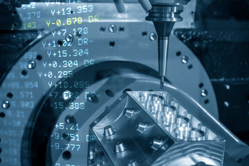 The  abstract scene 5-axis machining center cutting the v8-engine cylinder block and G-code data...