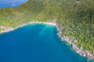 Clean Clear Blue Ocean Sea Water with rocks beach no people copy space paradise tropical island beautiful Koh Tao Thailand drone ariel aerial uav