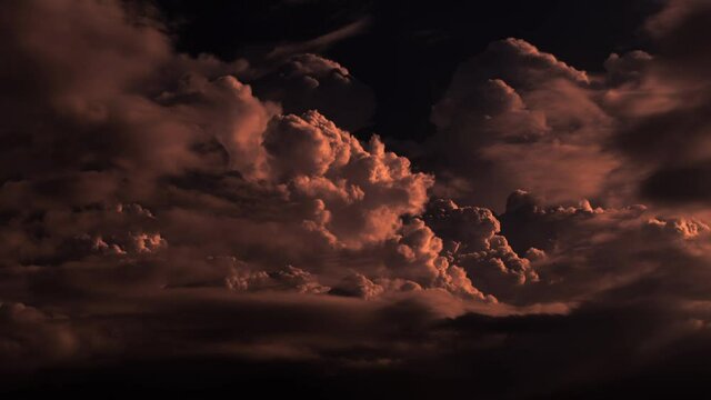 Dark fire clouds at sunset during monsoon season, Southeast Asia.