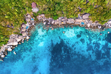 Clean Clear Blue Ocean Sea Water with rocks beach no people copy space paradise tropical island beautiful Koh Tao Thailand drone ariel aerial uav