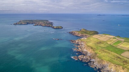 Gateholm Island at Marloes Beach, Pembrokeshire, Wales, drone aerial shot with copy space