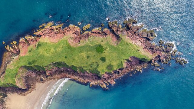 Gateholm Island at Marloes Beach, Pembrokeshire, Wales, drone aerial shot with copy space