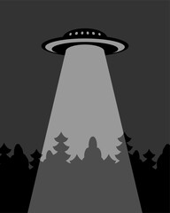 UFO over forest. Flying saucer flies over forest