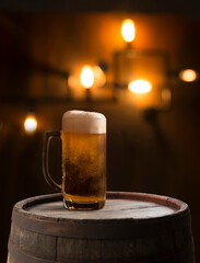 A wine cellar full of barrels of wine