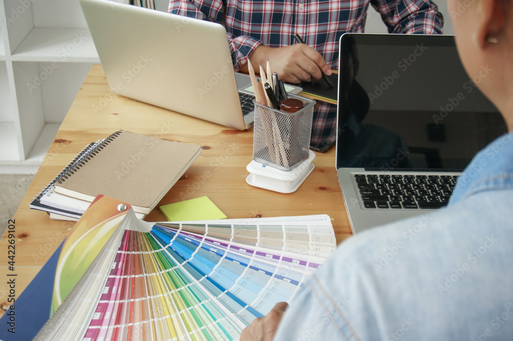Fototapete Graphic designer working on digital tablet. artist drawing on graphic tablet and Color swatch samples. Artist Creative Designer sketch graphic drawing creative creativity draw studying work on tablet