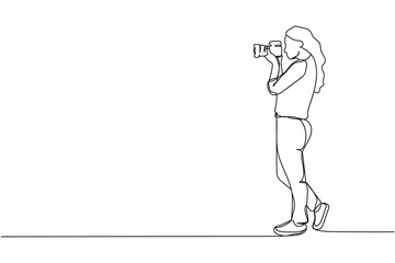 Continuous one line of woman photographer in silhouette on a white background. Linear stylized.Minimalist.