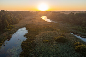 Aerial view of a sunrise on the oxbow lake on the Drava River