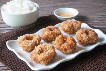Deep Fried Shrimp Cakes  serve witch plum Sauce and rice.It is crispy and yummy.