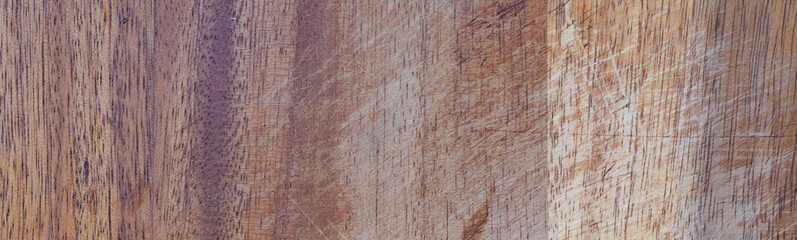 Wood cutting board have deteriorated from use, Close up . Wooden Background.