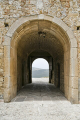 Fototapeta na wymiar Bovino, Italy, June 23, 2021. An archway at the entrance to a medieval village in southern Italy.