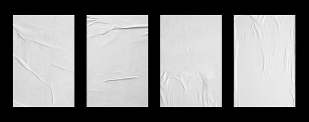 white crumpled and creased glued paper poster set isolated on black background