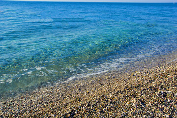 waves on the beach in kemer, antalya turkey