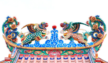 Obraz premium Chinese Dragon Statue on the wall gate isolated white background
