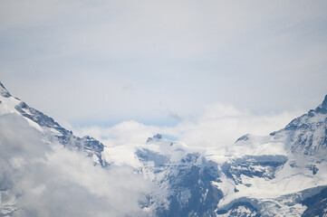 Fototapeta na wymiar Jungfraujoch in early summer seen from afar
