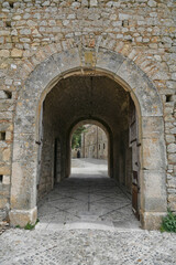Fototapeta na wymiar Bovino, Italy, June 23, 2021. An archway at the entrance to a medieval village in southern Italy.