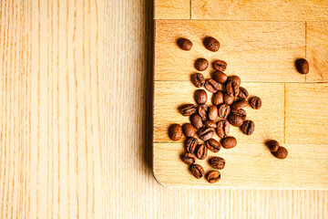 Coffee beans on wooden background