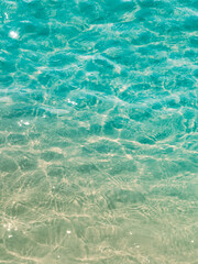 Surface transparent blue sea water.