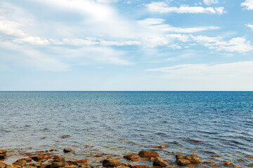 Fototapeta na wymiar Stony sea shore photo for a background