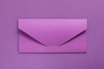 Violet Blank envelope on violet background. Template for branding identity. Top view.