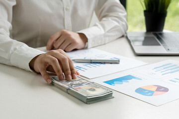 Fototapeta premium Man in shirt giving of money. Loan, finance, salary, bribe and donate concept.