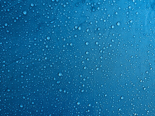 Water drops on waterproof membrane fabric. Morning dew on tent.
