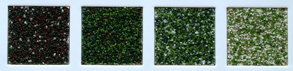 Examples of relief multicolored structures in a white frame. For construction and design. Green and brown shades