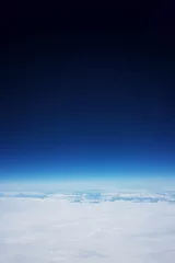 Fotobehang Flying over a glacier, a view from low Earth orbit © Bogdan
