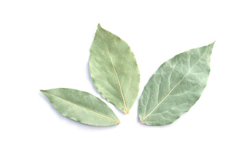 Three dried bay leaves or laurel isolated on white