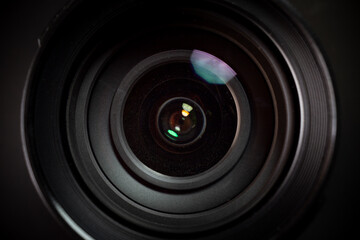 close-up photo of camera lens on black background