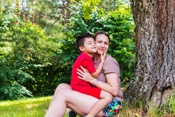 mother and son having fun in nature