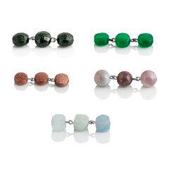 A set of natural gemstones and beads for jewelry and bijouterie. Template for designers and layouts. Isolated on white with reflection