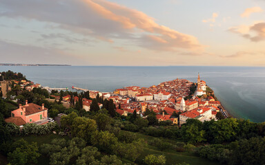 Fototapeta na wymiar Panoramic photo about piran's old town in Slovenia Amazing morning lights in this peninsula with the Zvonik Campanile Bell Tower what is the landmark this town.