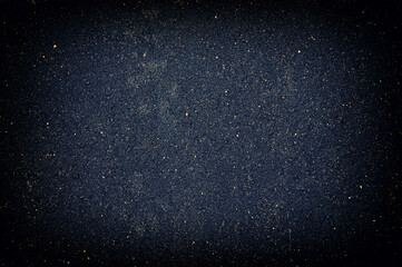 dark blue rough abstract background with small specks