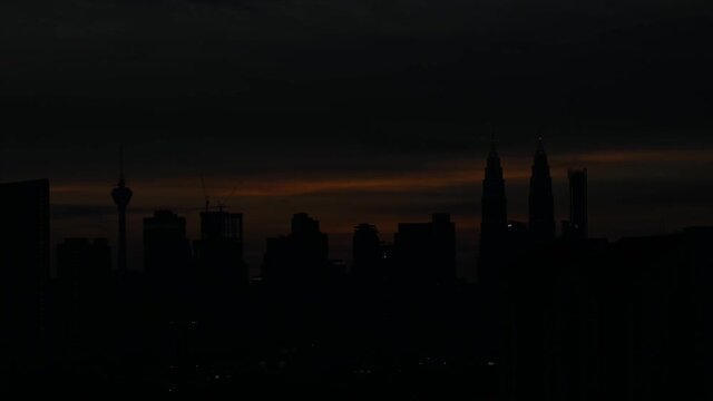 Kuala Lumpur Sunset with Kuala Lumpur Tower and Petronas Twin Towers