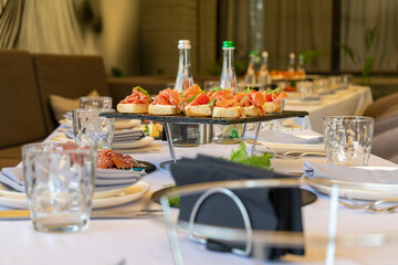 table in a restaurant with food and serving