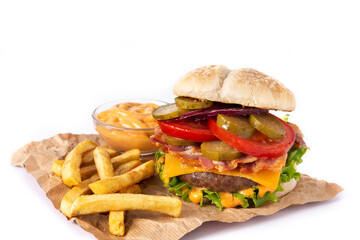 Beef burger with cheese, bacon and french fries isolated on white background