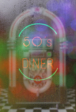 Jukebox with Neon Sign 50's Diner Photo Composite image